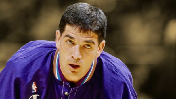 John Stockton stretches before the Utah Jazz-San Antonio Spurs matchup at the Alamodome