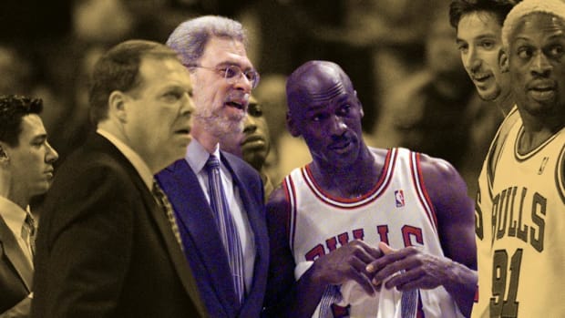 April 24, 1998; Chicago Bulls head coach Phil Jackson and shooting guard Michael Jordan during timeout at the United Center