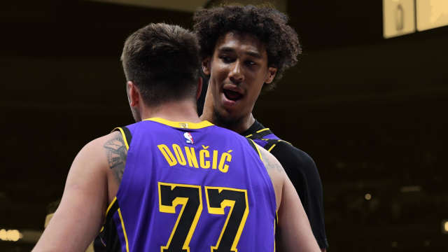 Los Angeles Lakers guard Luka Doncic (77) is congratulated by center Jaxson Hayes (11