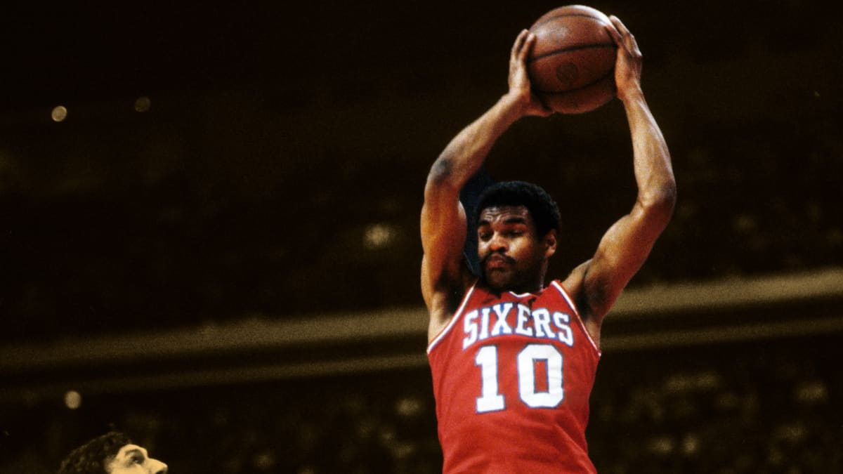 Philadelphia 76ers' Maurice Cheeks #10 makes a jumpshot against the New  York Nets during the playoffs at Meadowlands Arena circa 19…