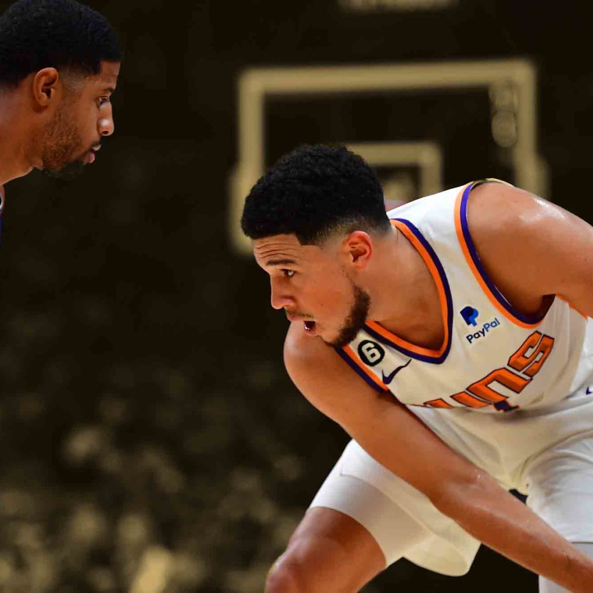 LeBron James congratulated Devin Booker post-game with a signed