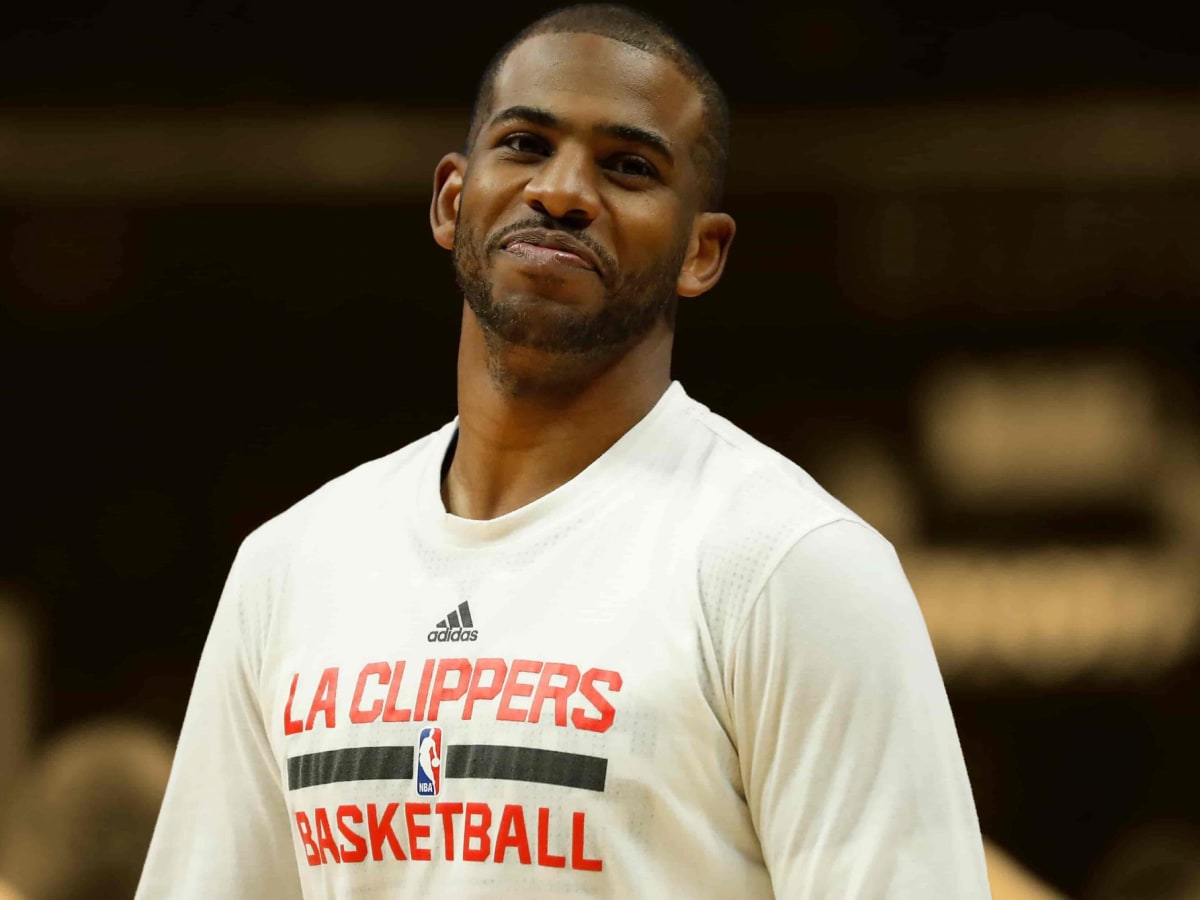 Chris Paul in blue short sleeve jersey bring the ball up in OKC - Clippers  News Surge NBA Gallery - Los Angeles Clippers Pictures & Photos