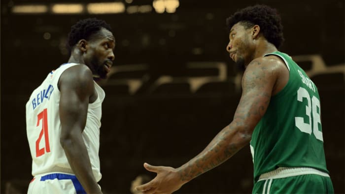 Penjaga Boston Celtics Marcus Smart dan penjaga Los Angeles Clippers Patrick Beverley