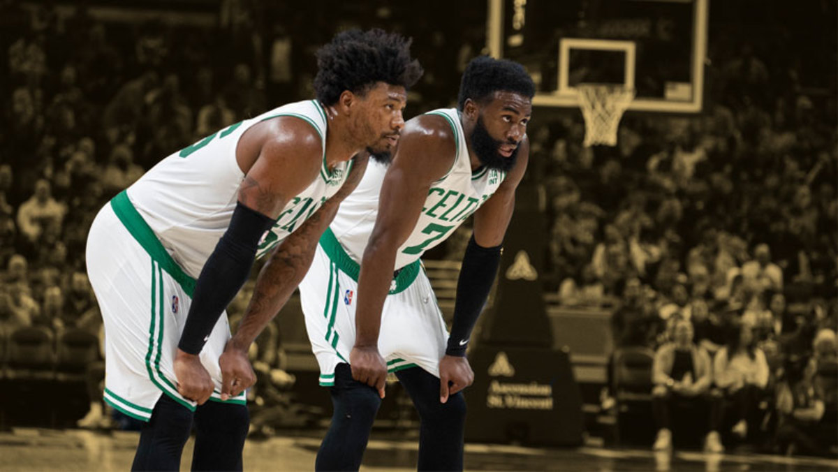 Marcus Smart is helped off the court after apparent injury